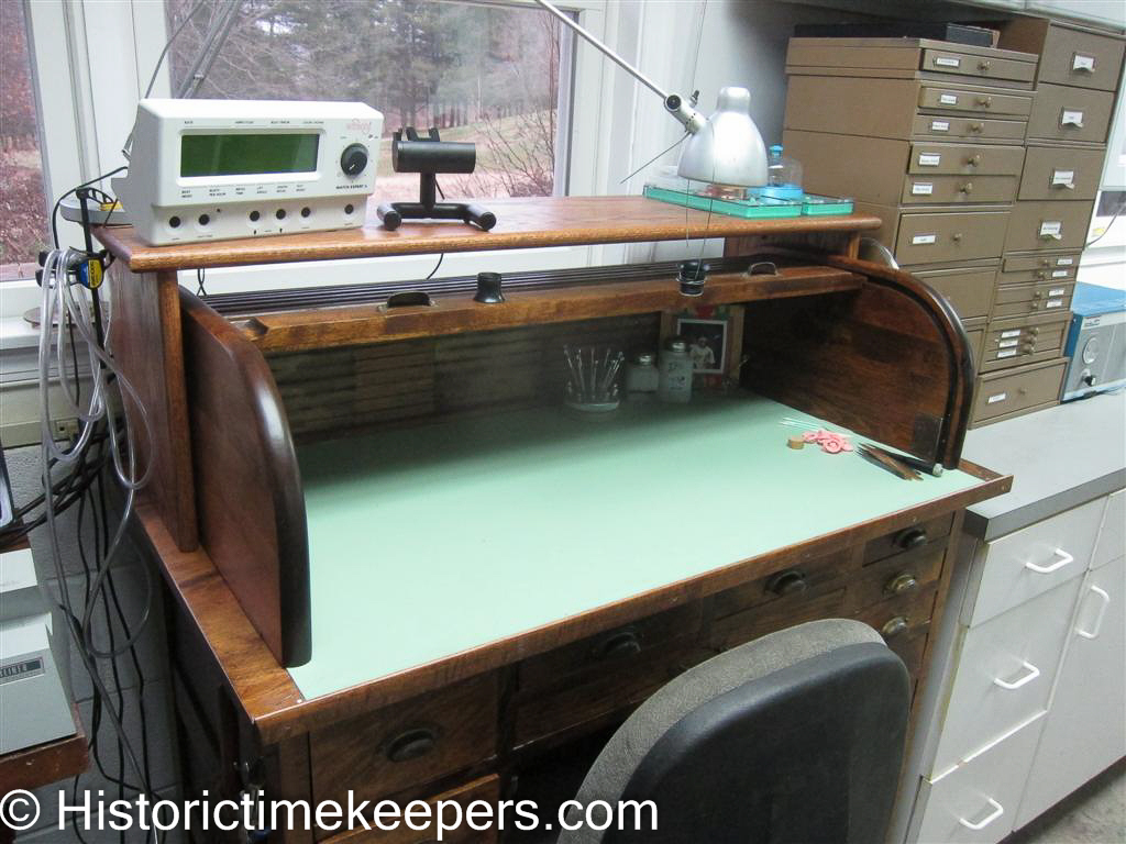 Watch repair restoration service bench timing machine